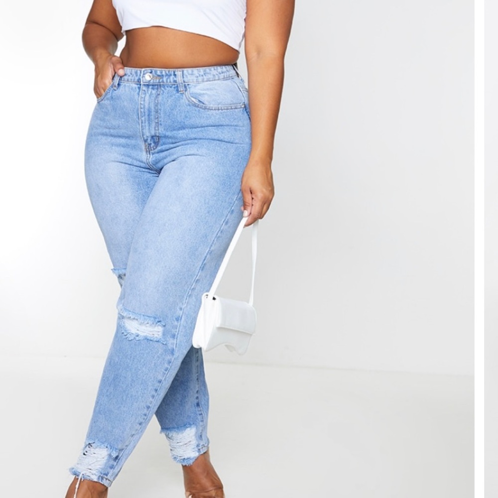 Light blue distressed jeans